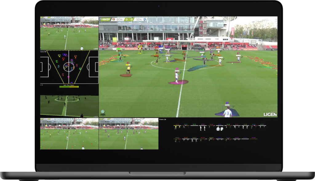 A laptop showing a soccer field with multiple analytical views, including player positioning and movement tracking.
